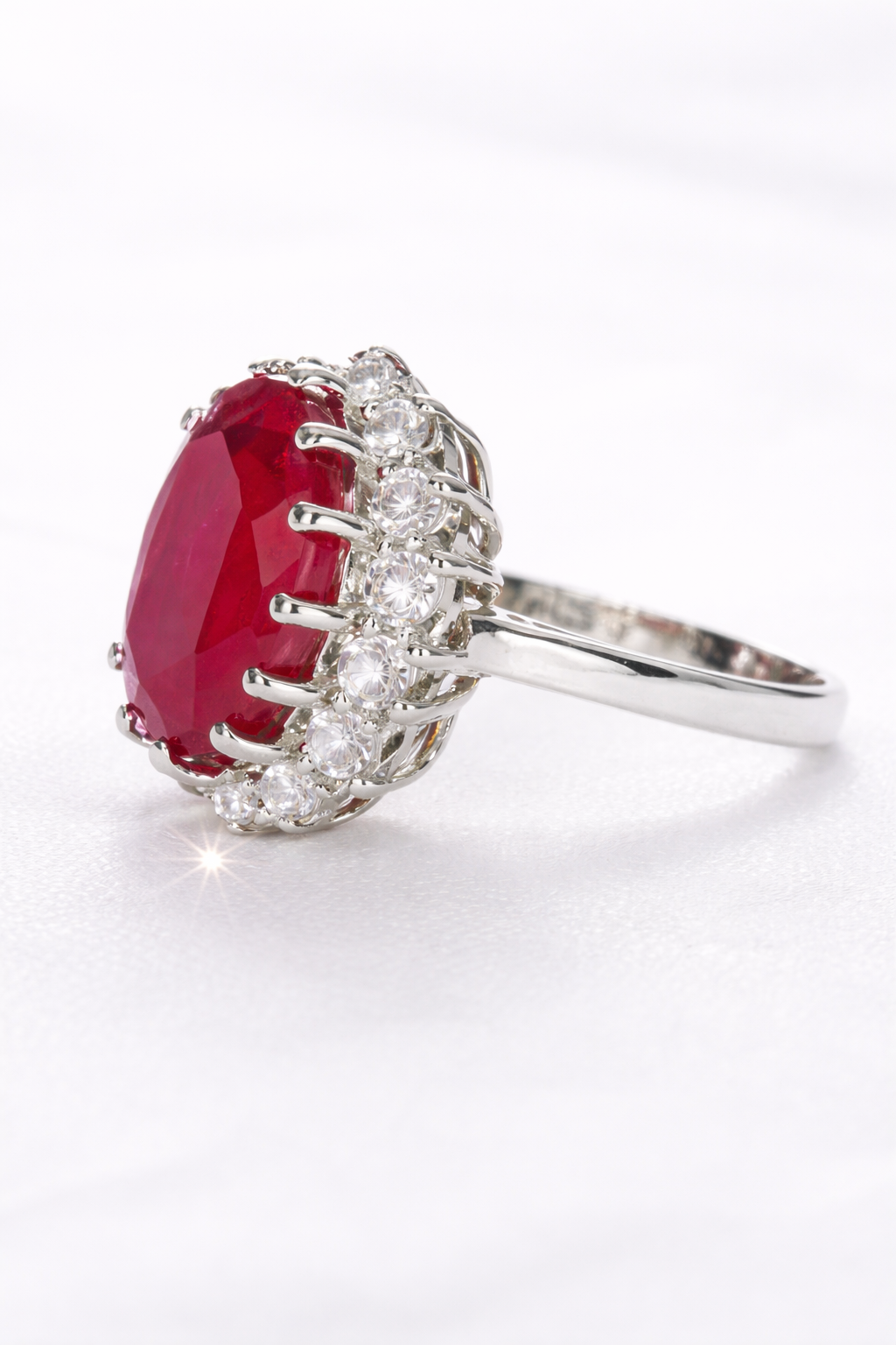 Oval Ruby Halo Ring with Moissanite Accent Stones – 925 Sterling Silver | Fawaz Jewellers